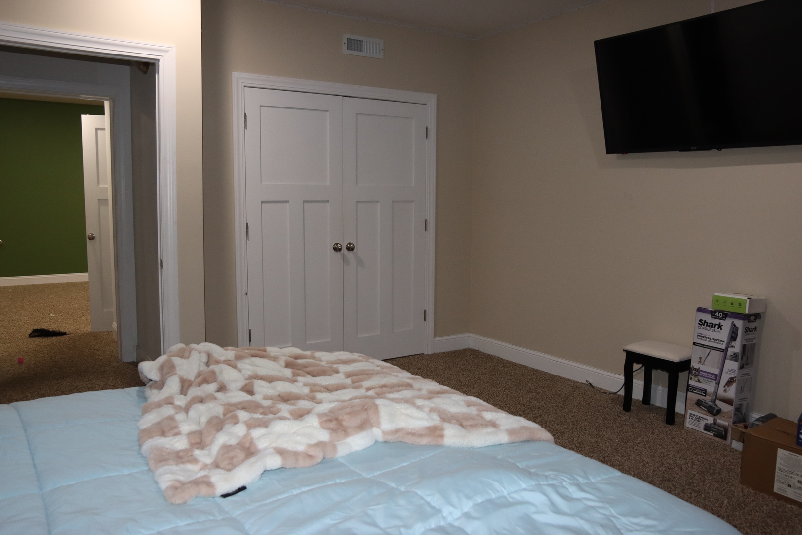 306 South 3rd Street Ashkum, IL 60911 - Photo 46 of 50 a bedroom with a bed and a flat screen tv