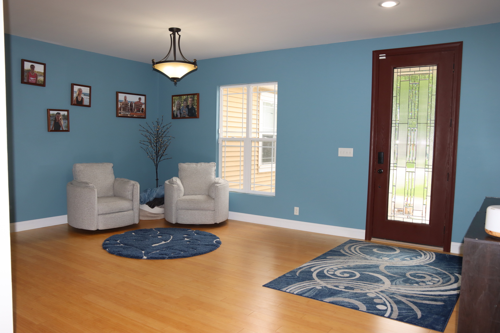306 South 3rd Street Ashkum, IL 60911 - Photo 8 of 50 a living room with furniture and a window