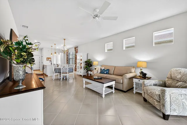 a kitchen with stainless steel appliances a refrigerator and cabinets