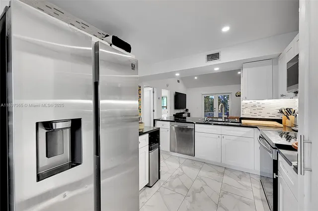 $420,000 | 18578 Woodstream Drive, Boca Raton, FL 33498