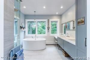 16 Sahler Mill Road Olivebridge, NY 12461 - Photo 31 of 50 a bathroom with a bathtub and a sink