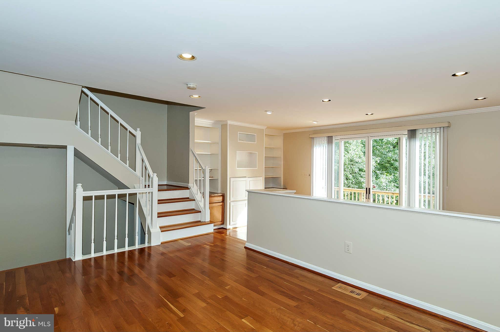 DINING ROOM WITH CHERRY FLOORS