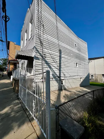 a view of a balcony with furniture