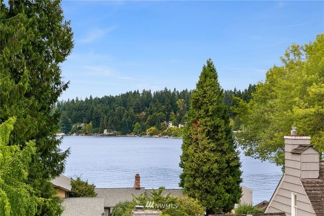a view of a patio with furniture and a table
