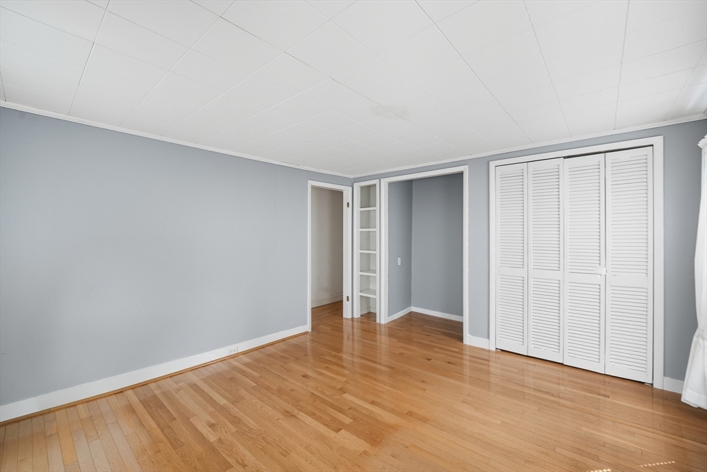 254 Route 20 Chester, MA 01011 - Photo 22 of 38 a view of an empty room with wooden floor