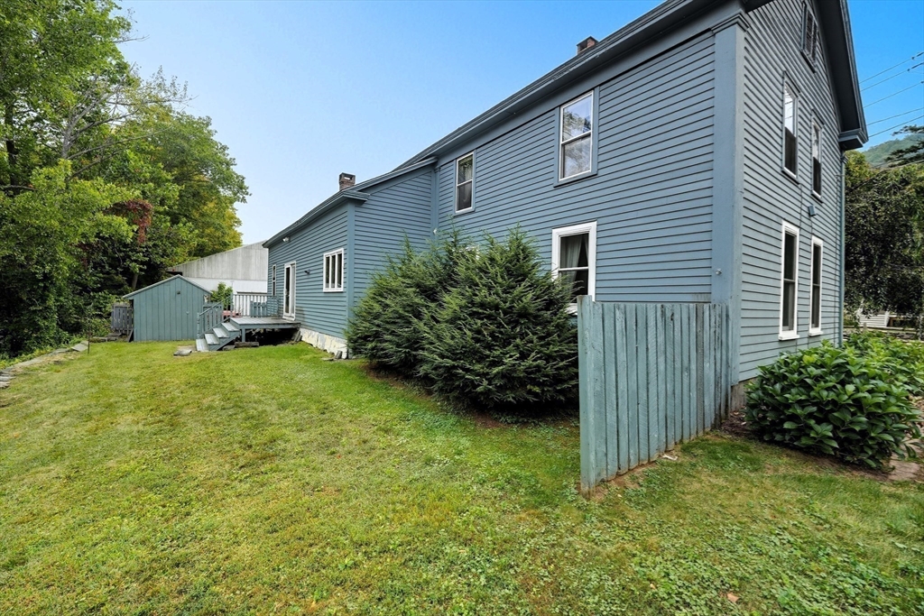 254 Route 20 Chester, MA 01011 - Photo 34 of 38 a view of a house with backyard and garden
