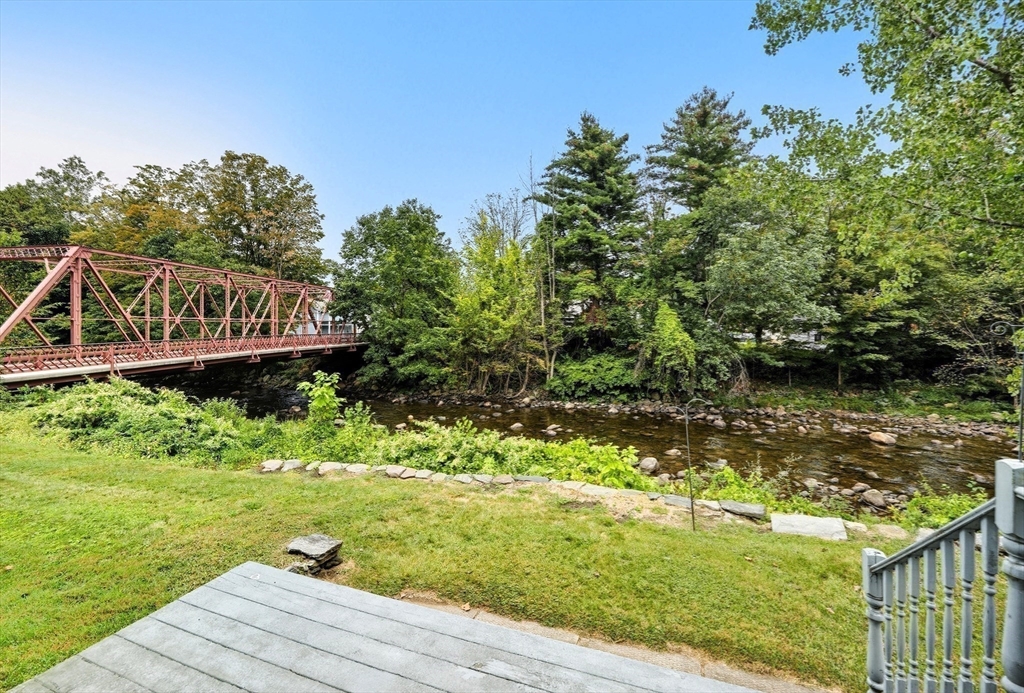 254 Route 20 Chester, MA 01011 - Photo 35 of 38 a view of a garden with wooden fence