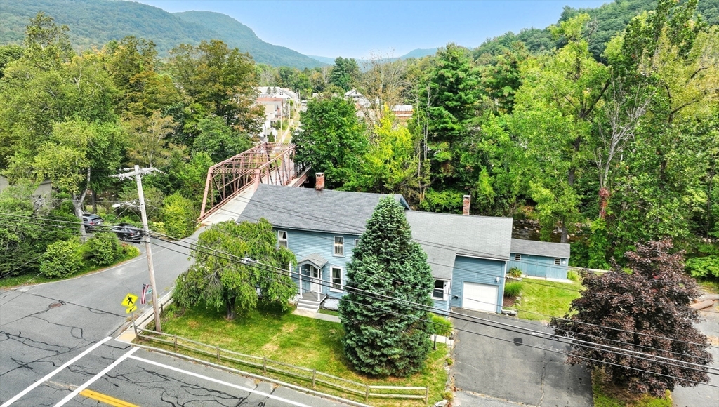 254 Route 20 Chester, MA 01011 - Photo 36 of 38 an aerial view of a house with a yard