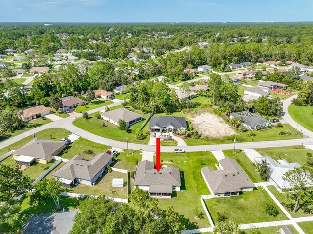 a front view of house with yard and seating area
