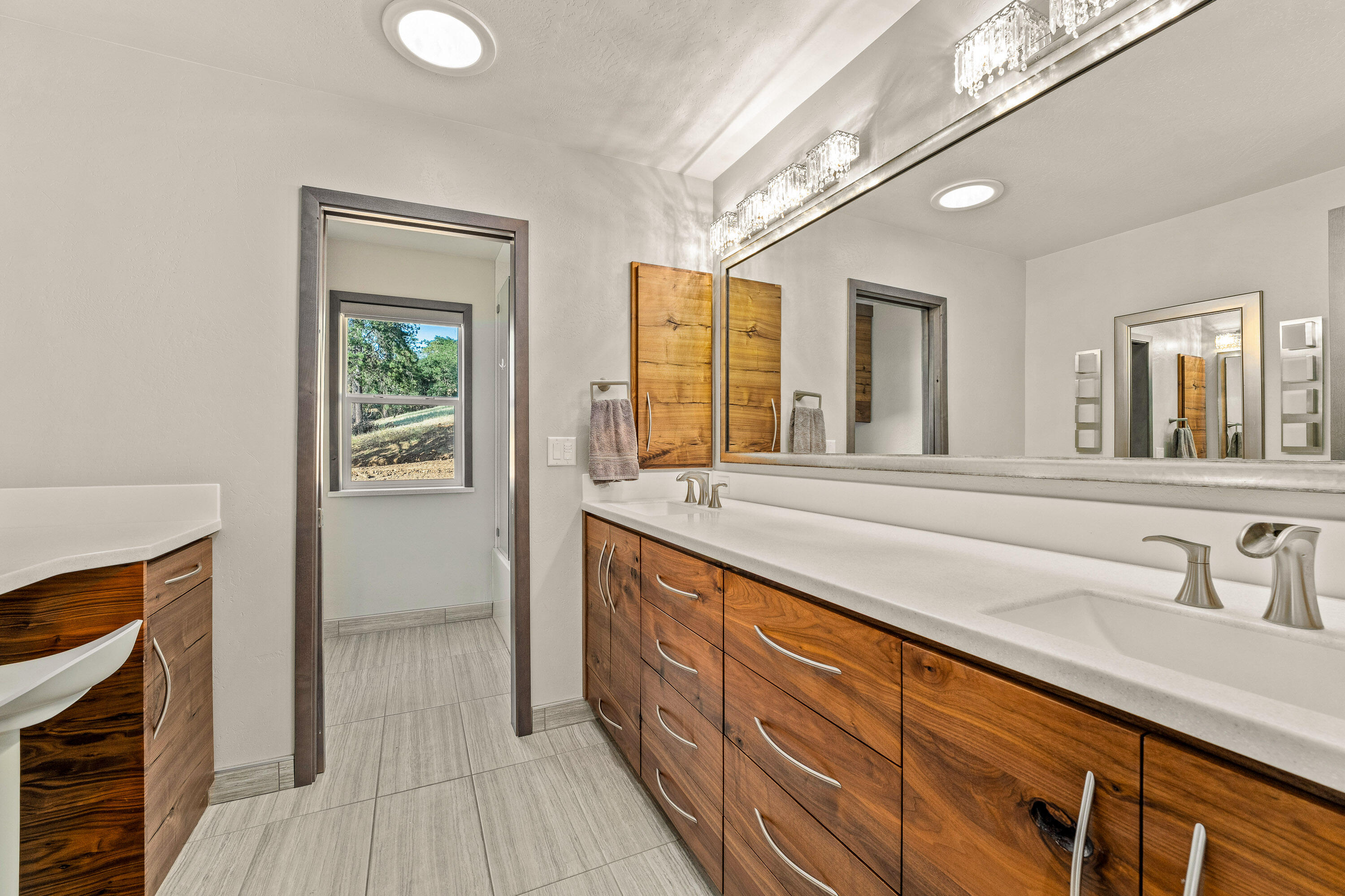 182 Wards Creek Road Rogue River, OR 97537 - Photo 47 of 80 a spacious bathroom with a sink and a mirror