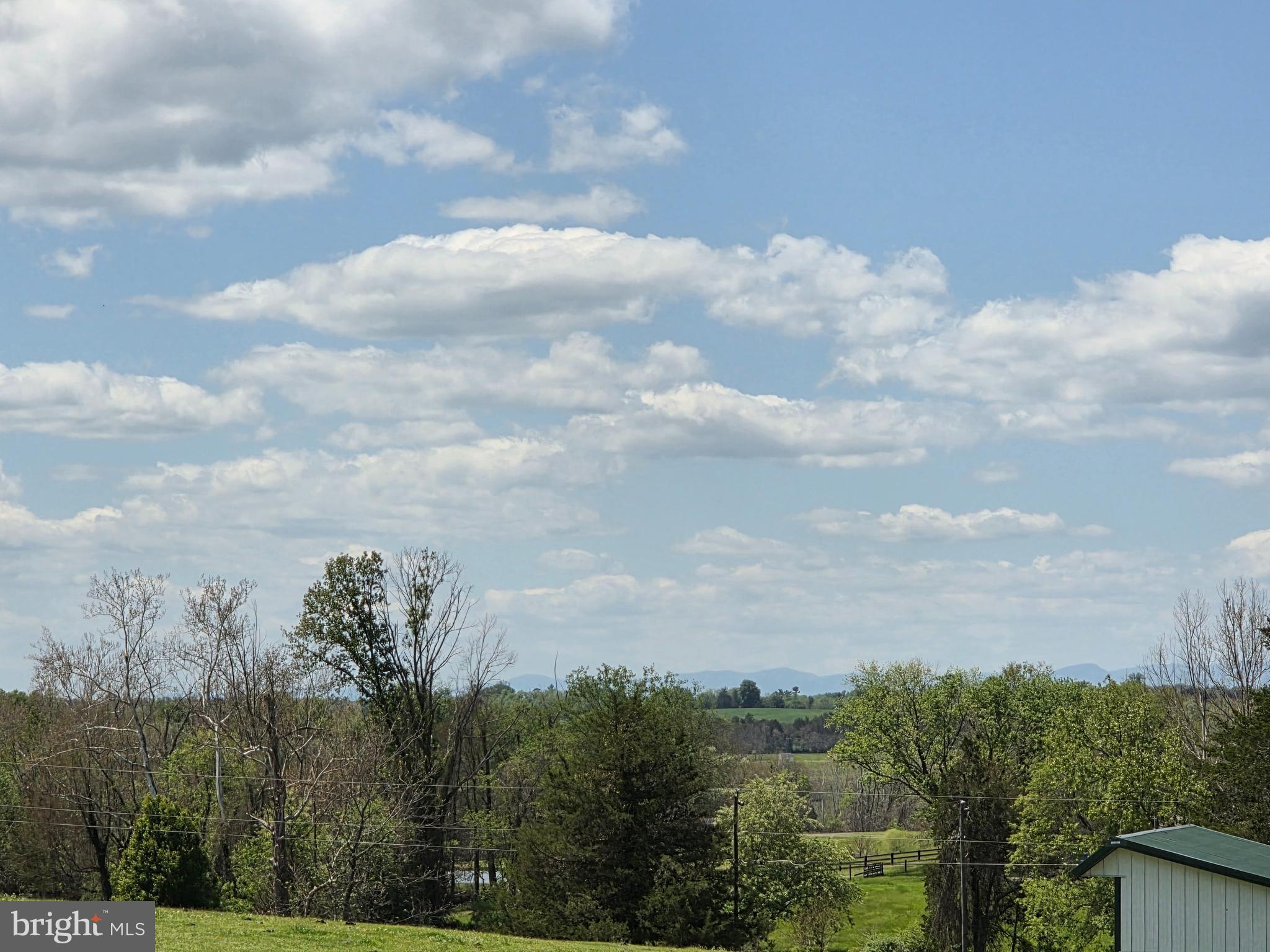 Leigh Road Warrenton, VA 20186 - Photo 4 of 11 a view of a lake with lots of trees