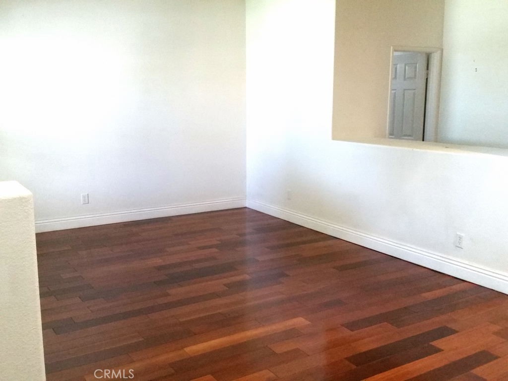 11410 Fitzpatrick Drive Rancho Cucamonga, CA 91730 - Photo 4 of 22 a view of a small space with wooden floor