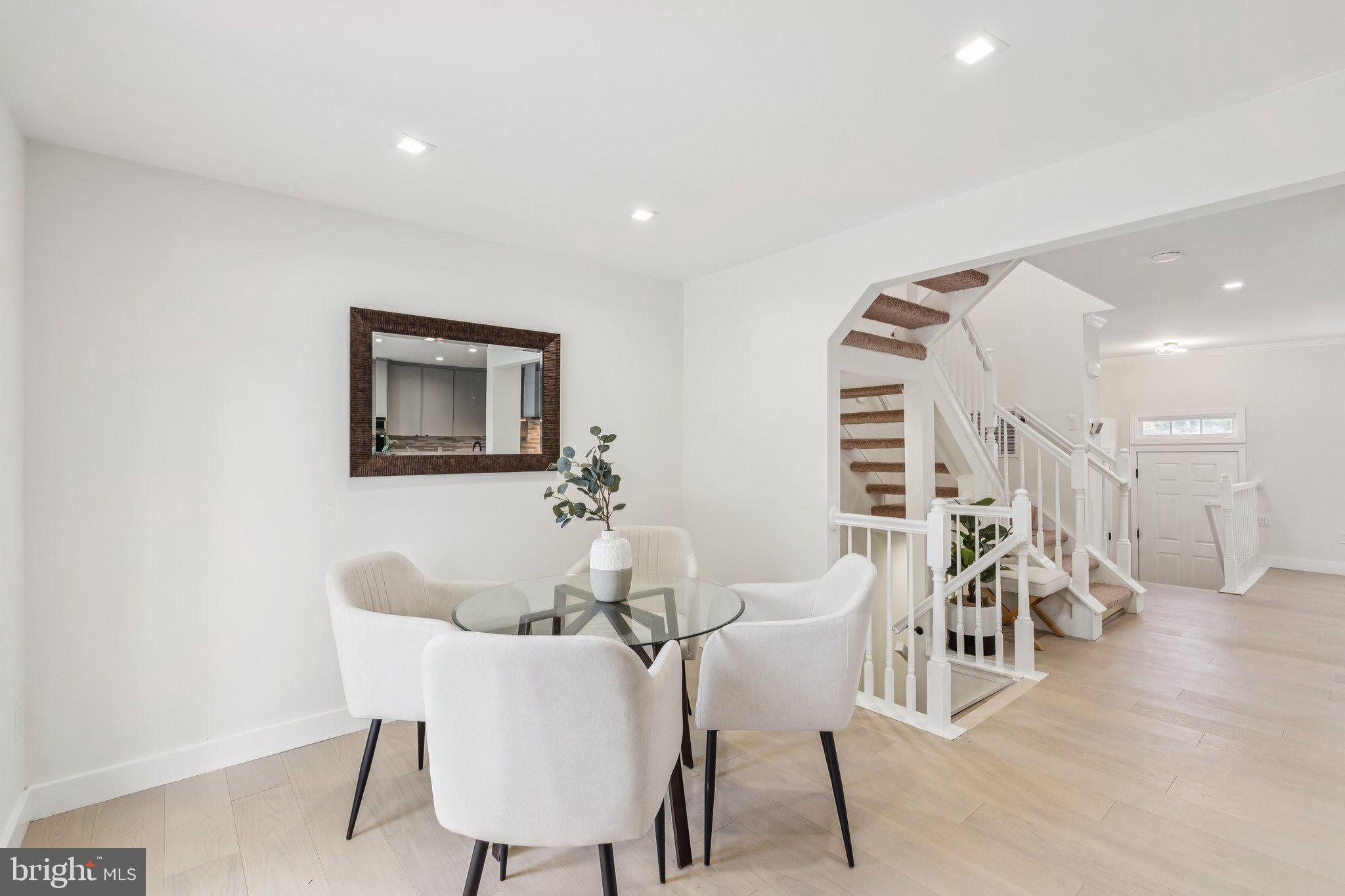 43501 Postrail Square Ashburn, VA 20147 - Photo 15 of 35 a dining room with furniture and wooden floor