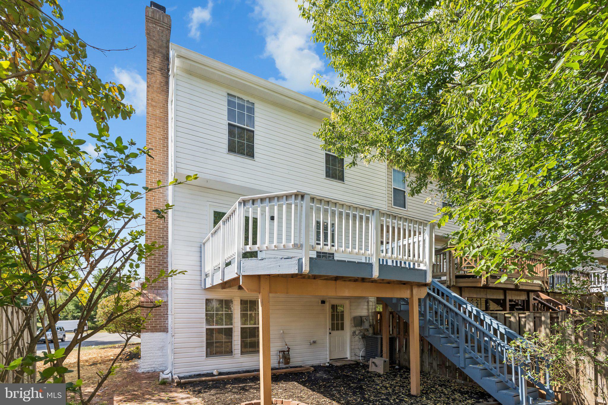 43501 Postrail Square Ashburn, VA 20147 - Photo 34 of 35 a view of a house with a tree front of house