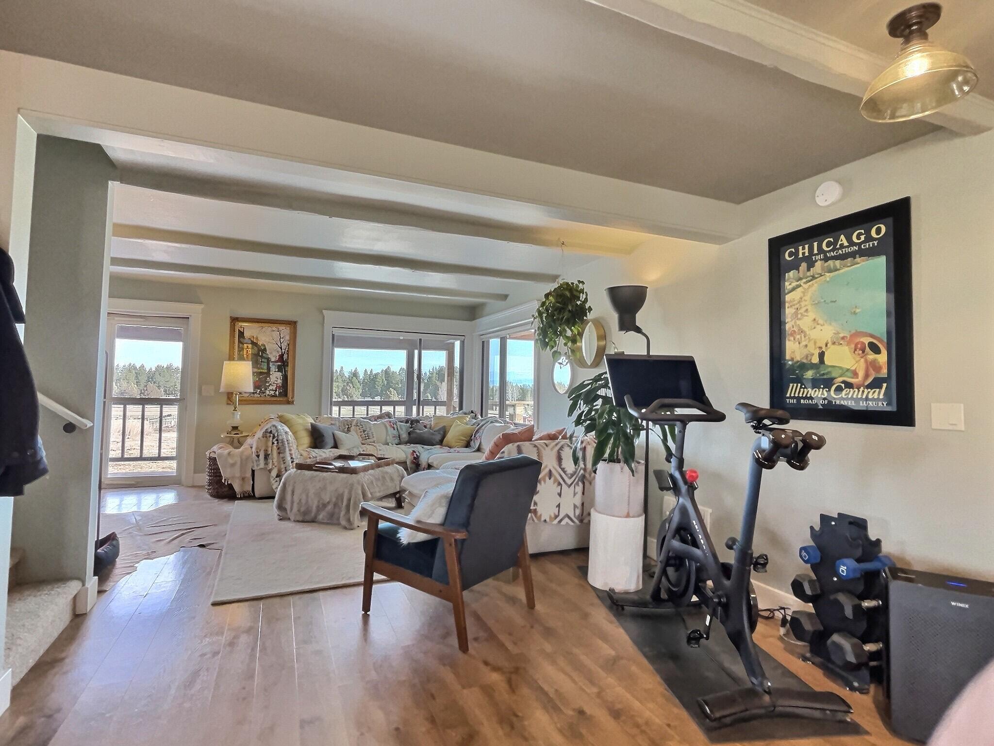 60360 Horse Butte Road Bend, OR 97702 - Photo 19 of 58 a living room with furniture and a flat screen tv