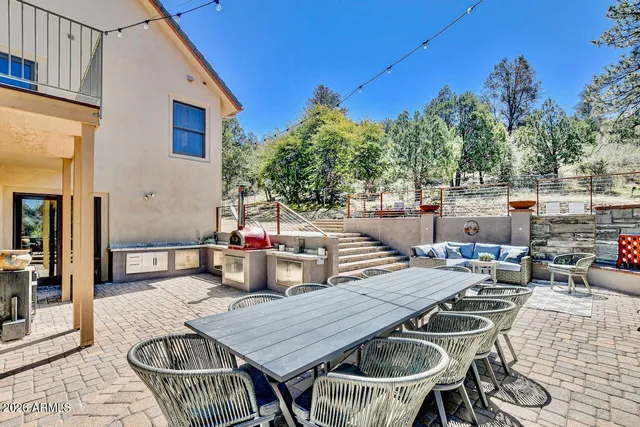 a outdoor living space with furniture and city view