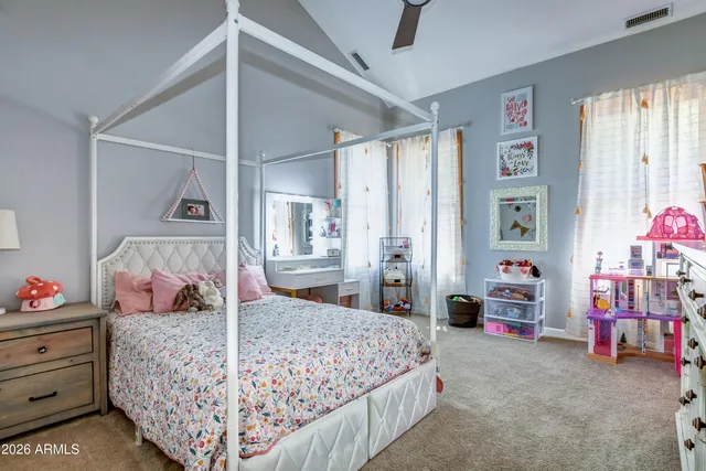 an aerial view of a house with outdoor space