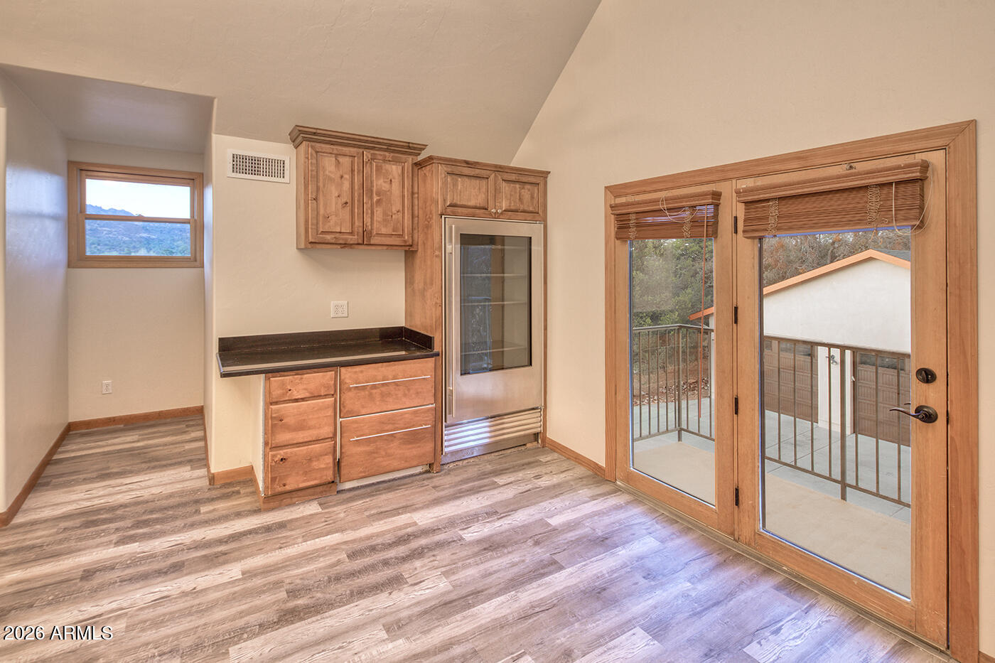 3000 Shadow Valley Ranch Road Prescott, AZ 86305 - Photo 51 of 70 a kitchen with a refrigerator and a sink