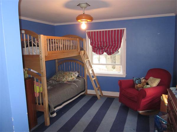 50 Redgate Road Boston, MA 02132 - Photo 9 of 14 a bedroom with a bed and window