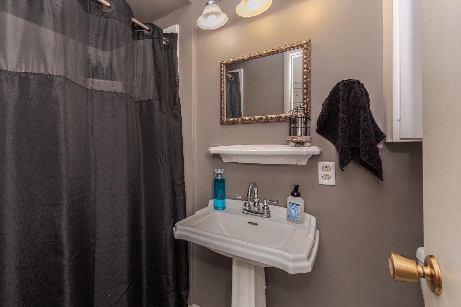208 Foster Drive Normal, IL 61761 - Photo 18 of 32 a bathroom with a sink a toilet and mirror