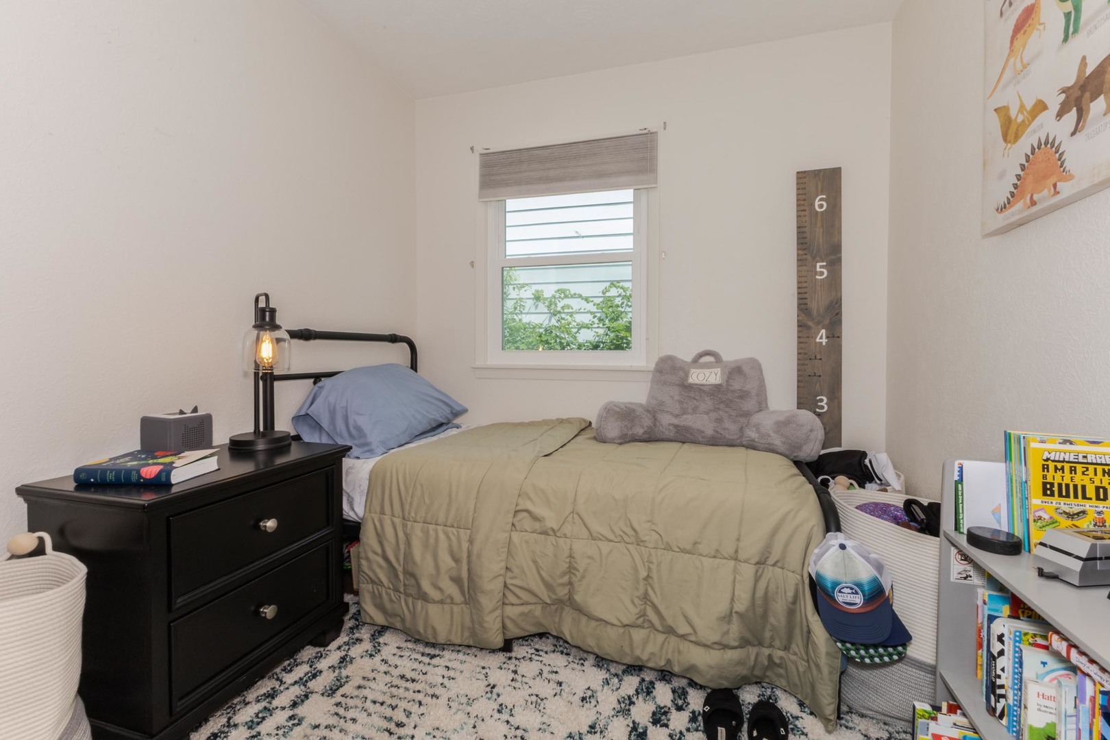 208 Foster Drive Normal, IL 61761 - Photo 19 of 32 a bedroom with a bed and a table