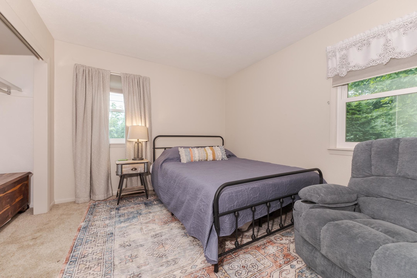 208 Foster Drive Normal, IL 61761 - Photo 20 of 32 a bedroom with a bed and a couch