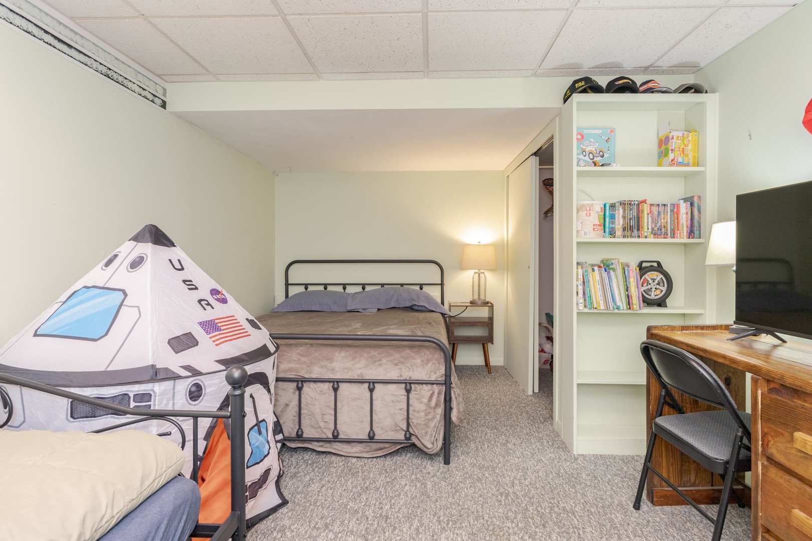 208 Foster Drive Normal, IL 61761 - Photo 25 of 32 a bedroom with furniture and a baby crib