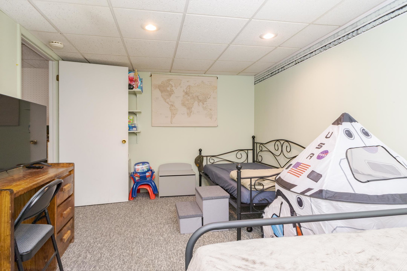 208 Foster Drive Normal, IL 61761 - Photo 26 of 32 a view of a room with gym equipment