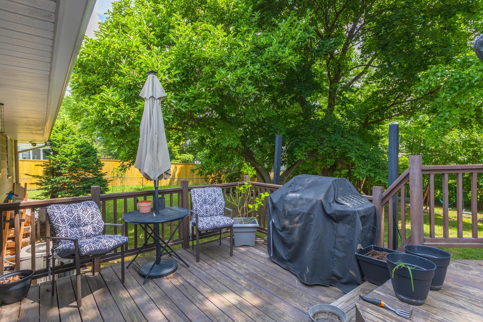 208 Foster Drive Normal, IL 61761 - Photo 27 of 32 a view of deck with furniture and garden