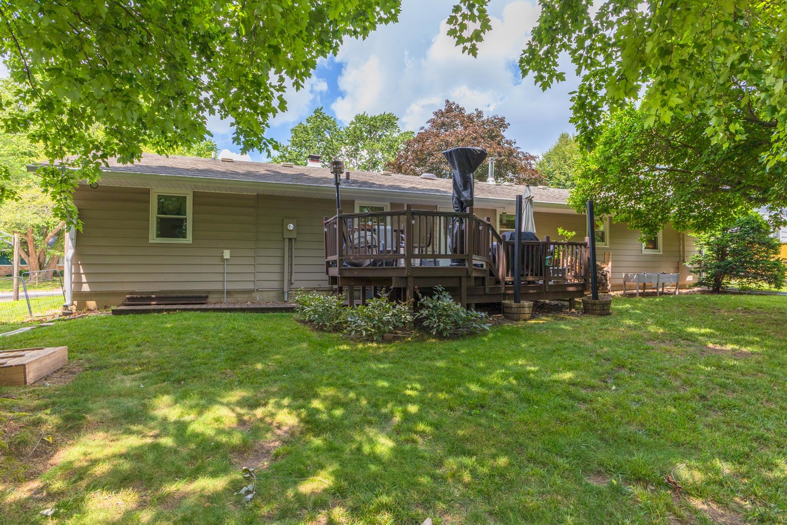 208 Foster Drive Normal, IL 61761 - Photo 32 of 32 a front view of a house with a garden
