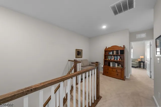 a view of a hallway with workspace