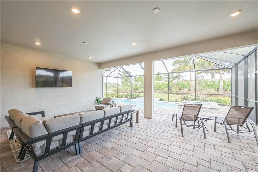 15111 Pescara Street Naples, FL 34114 - Photo 33 of 43 a view of a dining room with furniture window and outside view