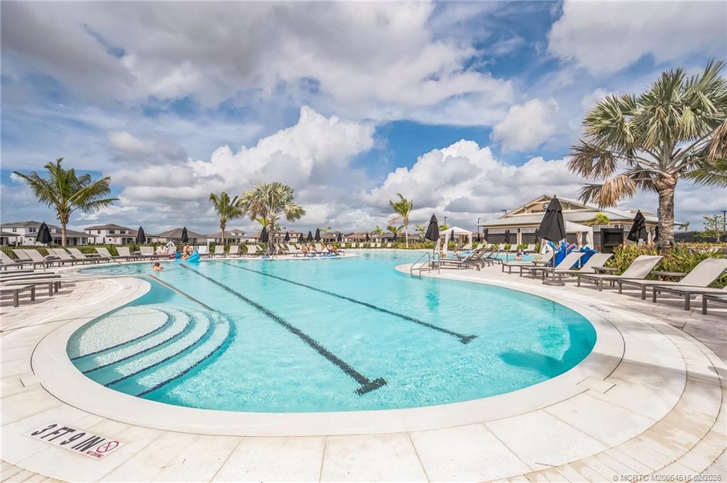 15111 Pescara Street Naples, FL 34114 - Photo 41 of 43 a view of a swimming pool with outdoor seating