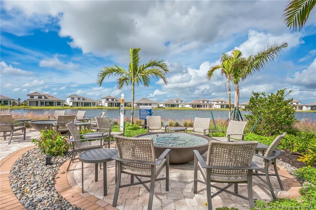 15111 Pescara Street Naples, FL 34114 - Photo 43 of 43 a view of a chairs and table in a patio