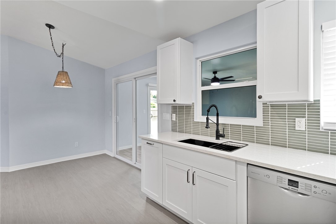 669 Vocelle Avenue Sebastian, FL 32958 - Photo 11 of 34 a kitchen with a sink and cabinets