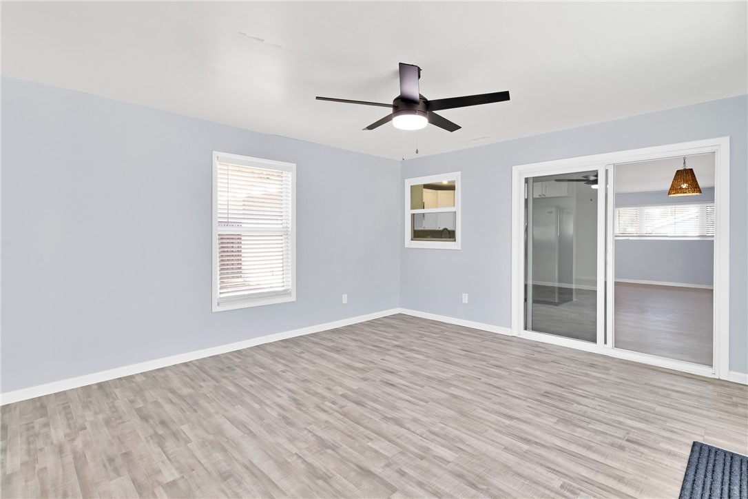 669 Vocelle Avenue Sebastian, FL 32958 - Photo 13 of 34 a view of empty room with wooden floor and fan