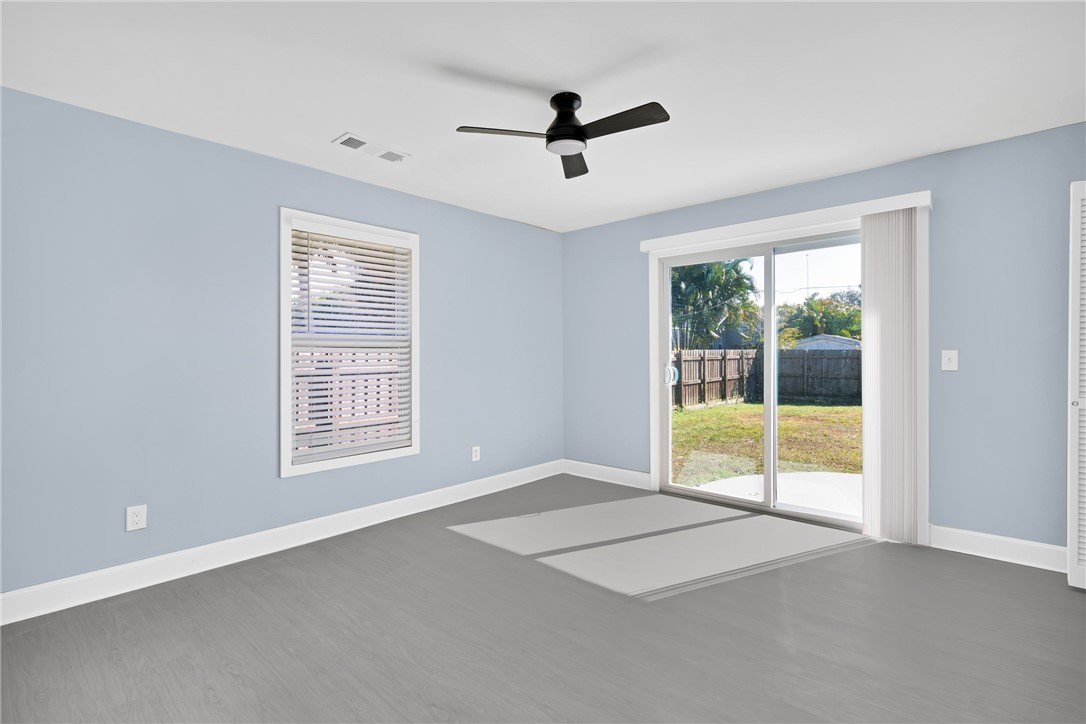 669 Vocelle Avenue Sebastian, FL 32958 - Photo 14 of 34 a view of an empty room with a window