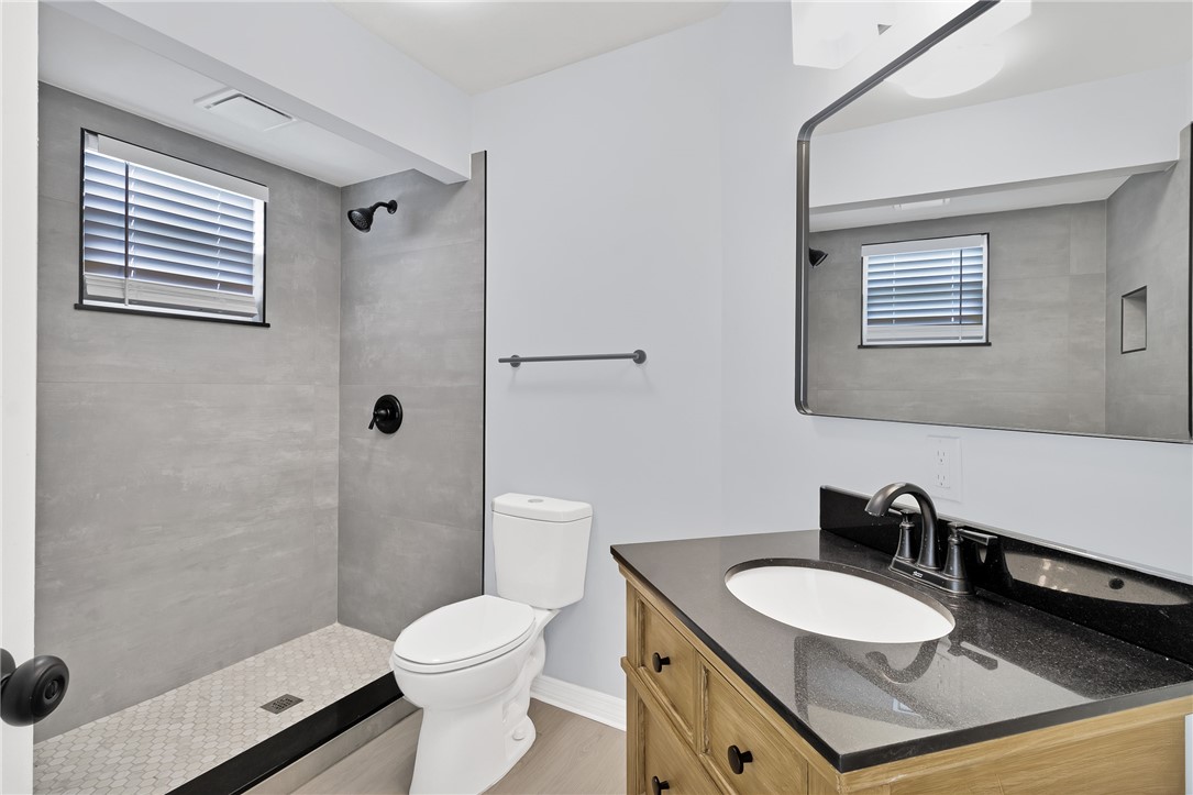 669 Vocelle Avenue Sebastian, FL 32958 - Photo 16 of 34 a bathroom with a sink toilet and shower