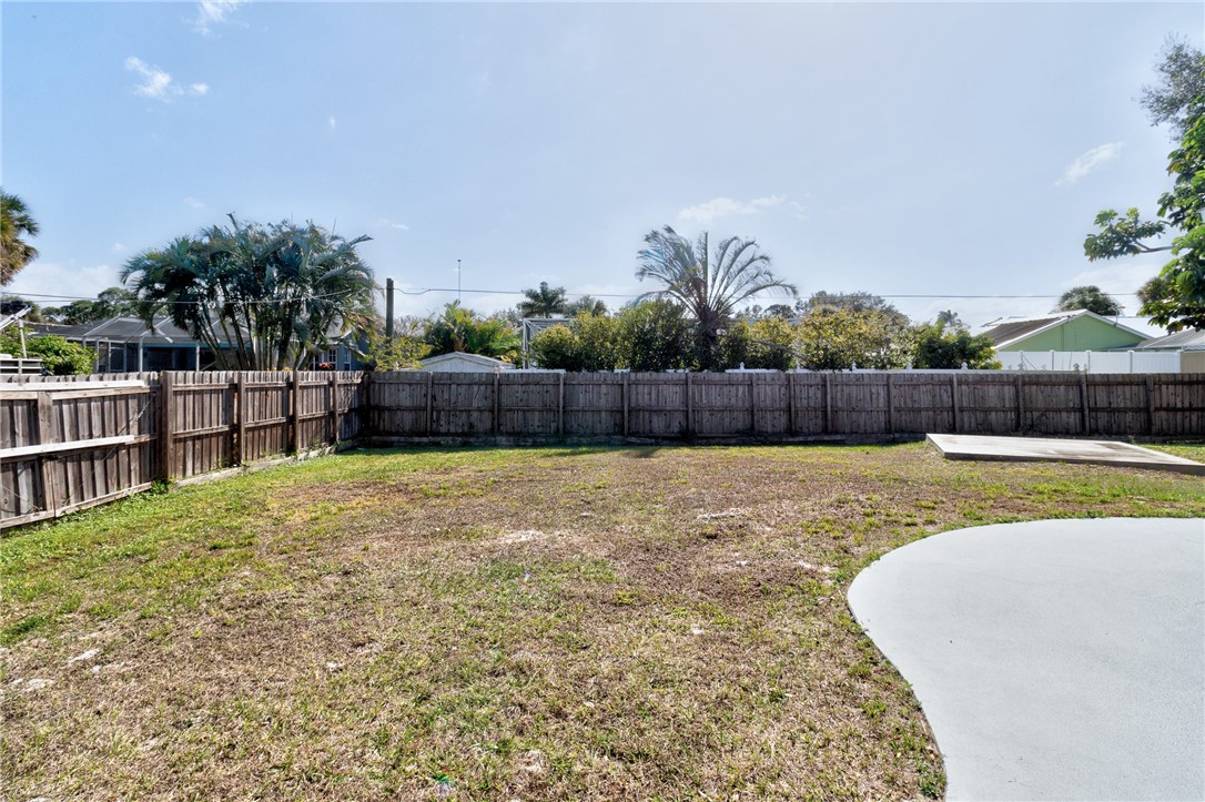 669 Vocelle Avenue Sebastian, FL 32958 - Photo 24 of 34 a view of a backyard