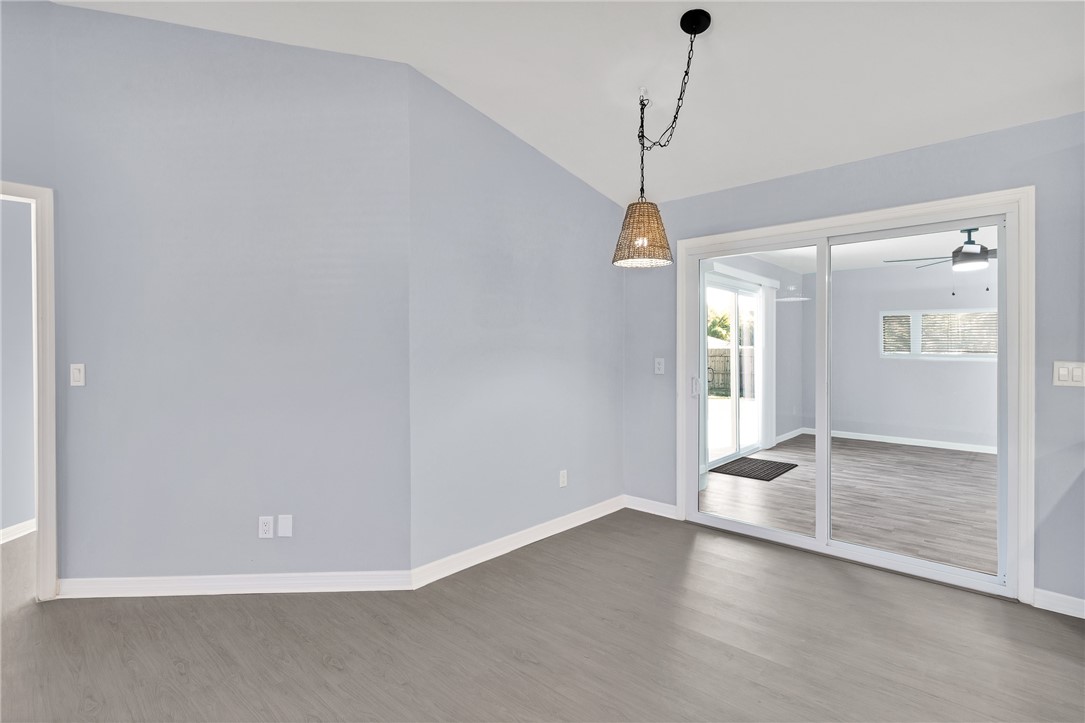 669 Vocelle Avenue Sebastian, FL 32958 - Photo 6 of 34 a view of a room with window and wooden floor