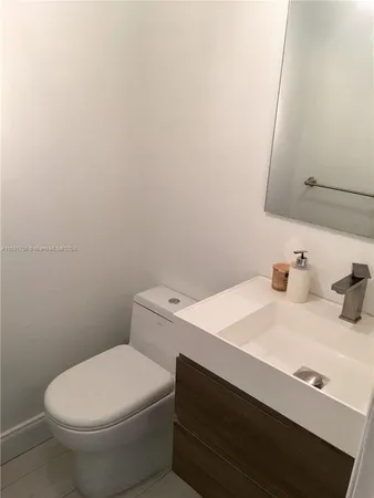 a bathroom with a sink and a toilet