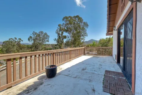 a view of a balcony with mountain view