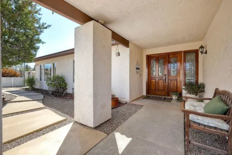 a view of an entryway with garden