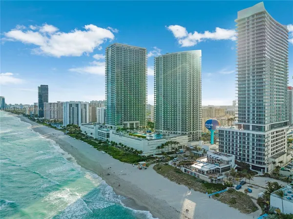 a view of a city with tall buildings
