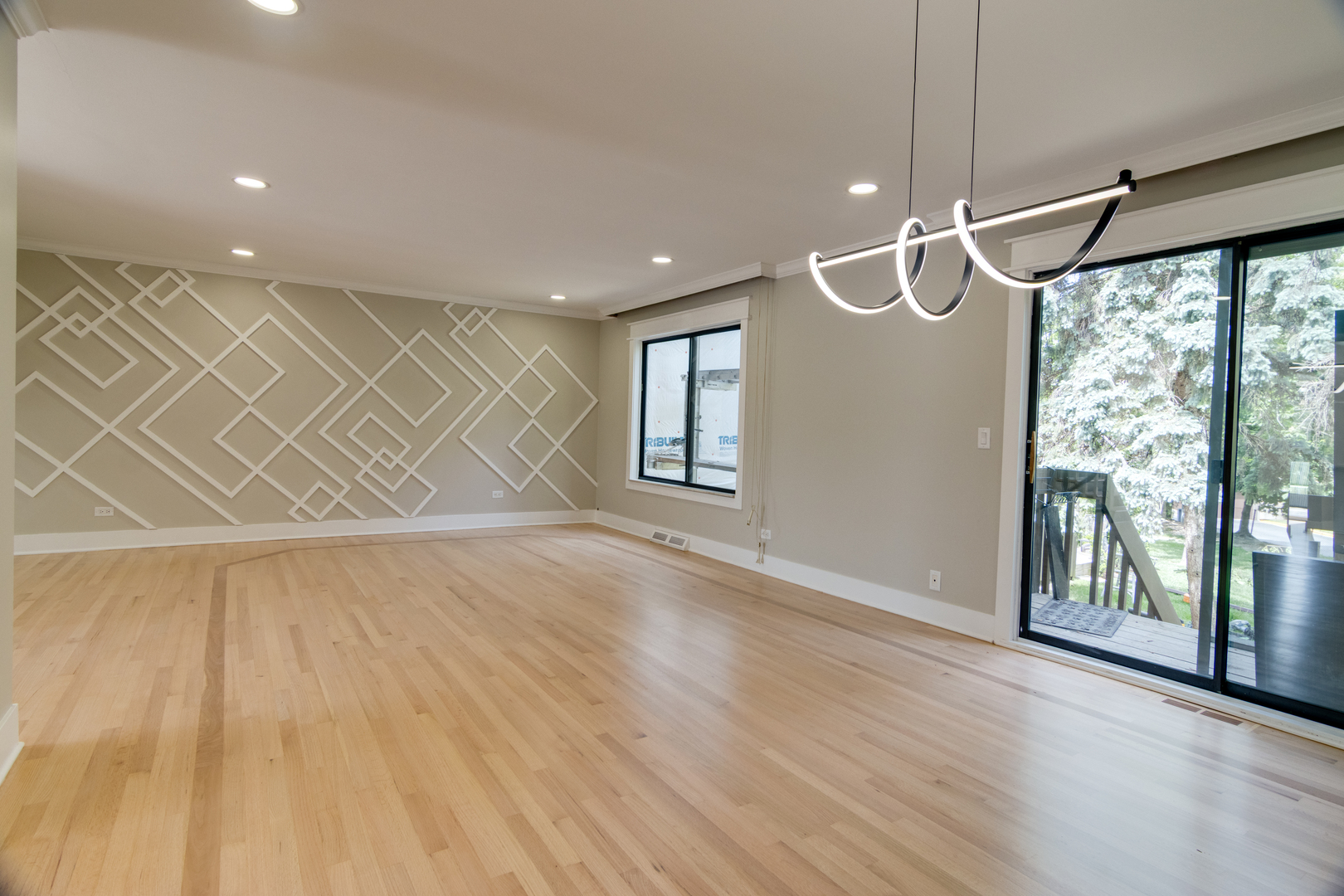40 Portwine Road Willowbrook, IL 60527 - Photo 17 of 42 a view of an empty room with wooden floor and a window