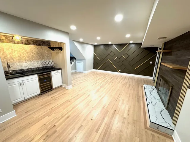 a view of a sink and dishwasher in a cabinet