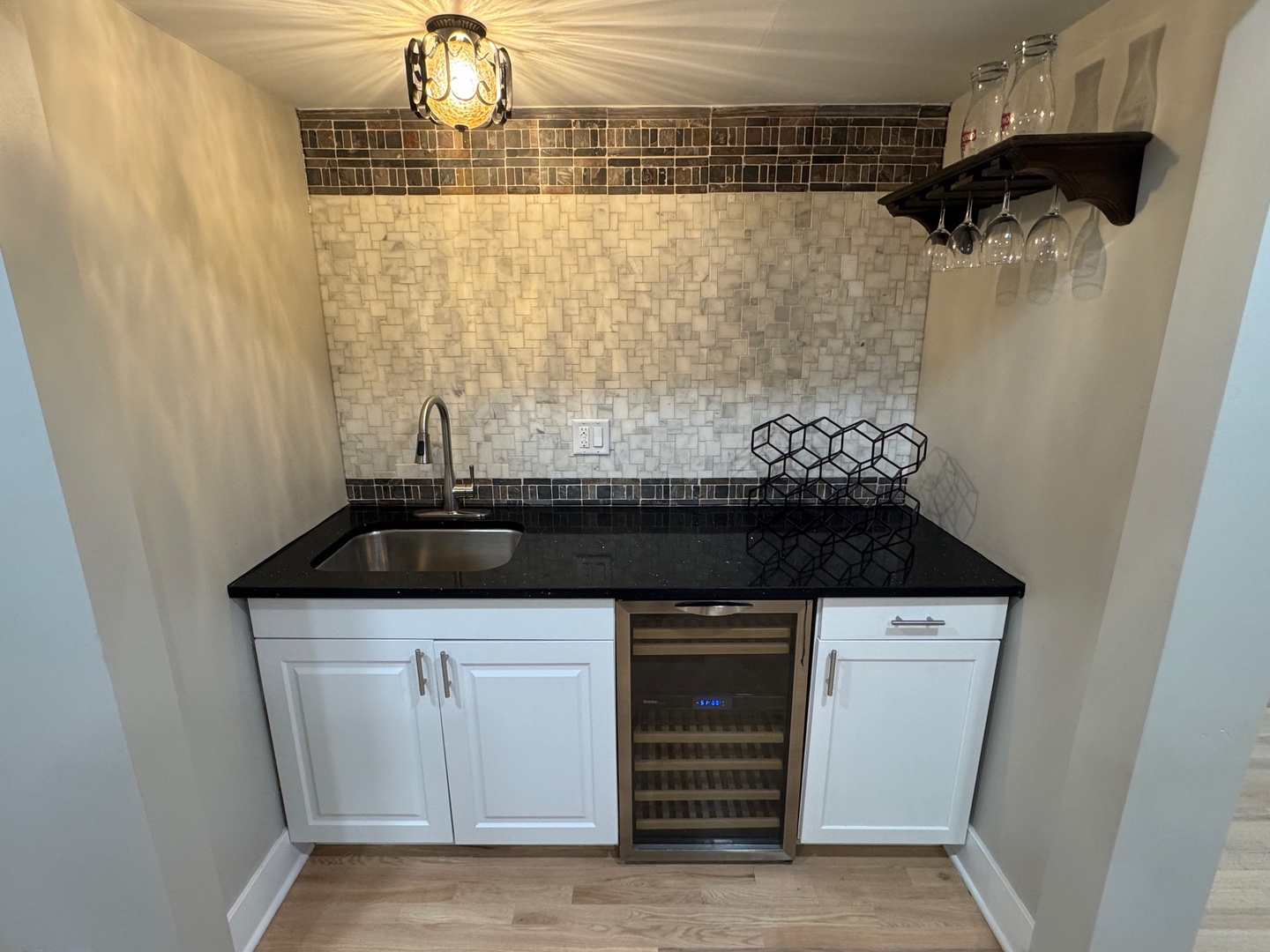 40 Portwine Road Willowbrook, IL 60527 - Photo 29 of 42 a view of a sink and dishwasher in a cabinet