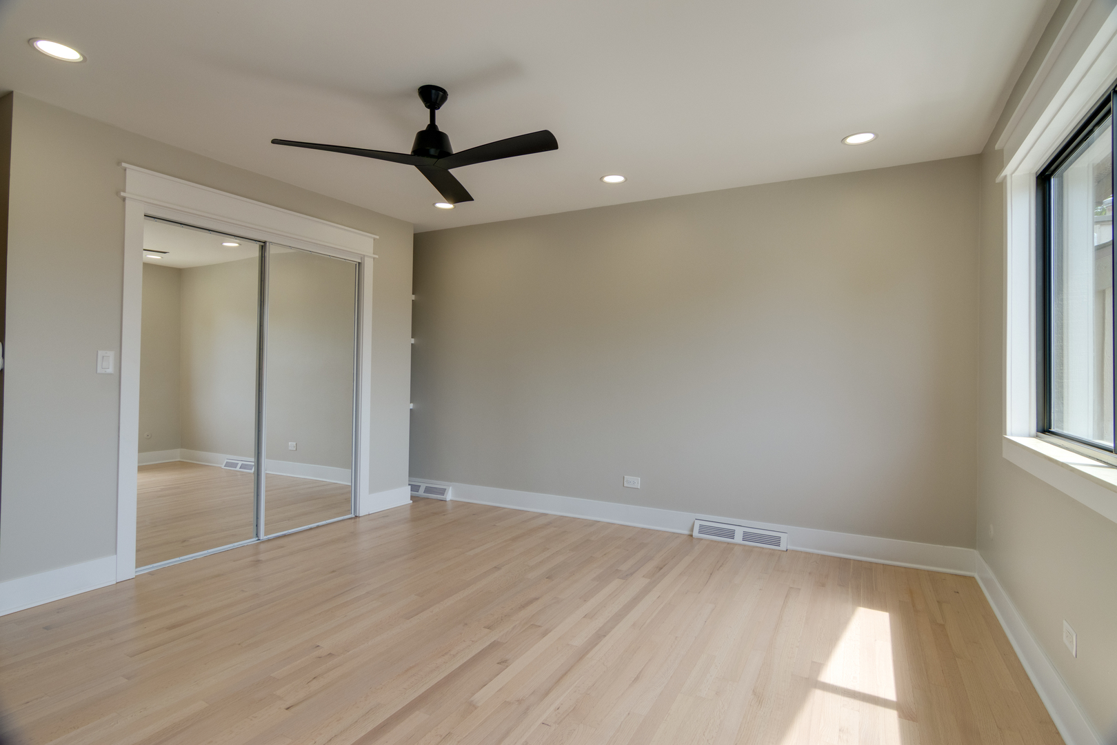 40 Portwine Road Willowbrook, IL 60527 - Photo 33 of 42 a view of empty room with wooden floor and fan