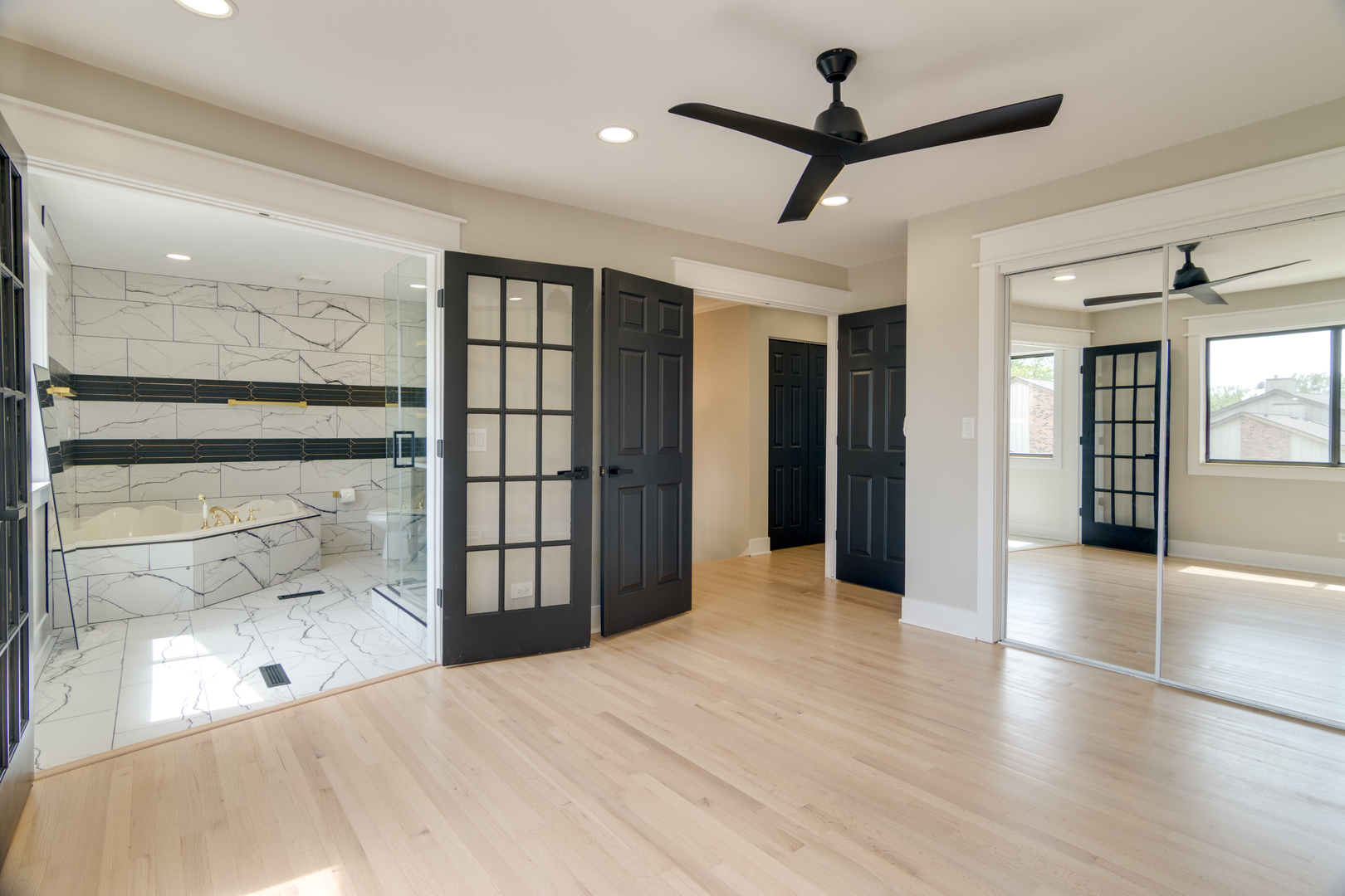 40 Portwine Road Willowbrook, IL 60527 - Photo 34 of 42 a view of empty room with wooden floor and fan