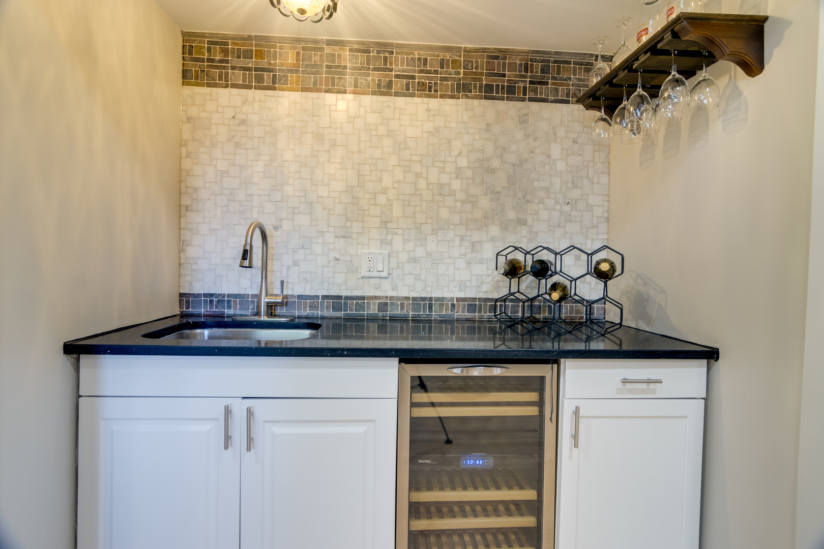 40 Portwine Road Willowbrook, IL 60527 - Photo 38 of 42 a sink with a granite countertop white sink and cabinets